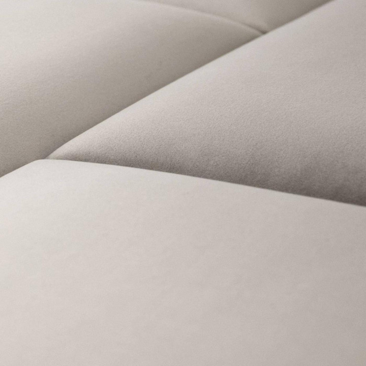 mur capitonné beige